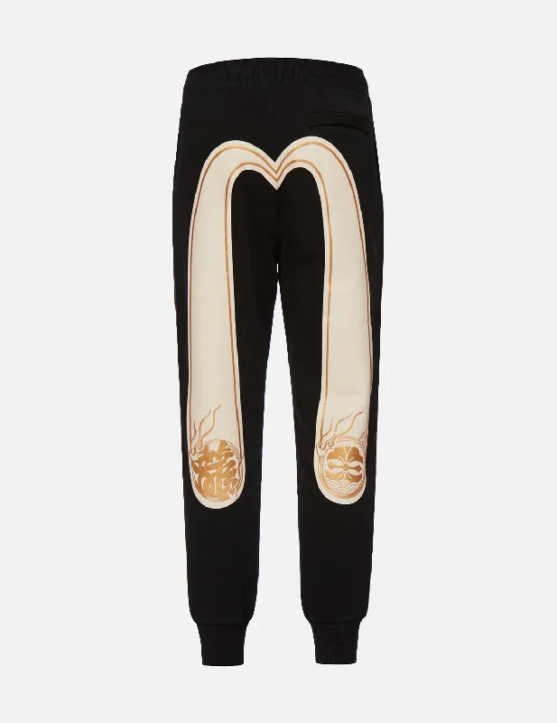 Men's cropped length casual linen pants for a breezy summer vibe Kanji and Kamon Foil-print Daicock Sweatpants