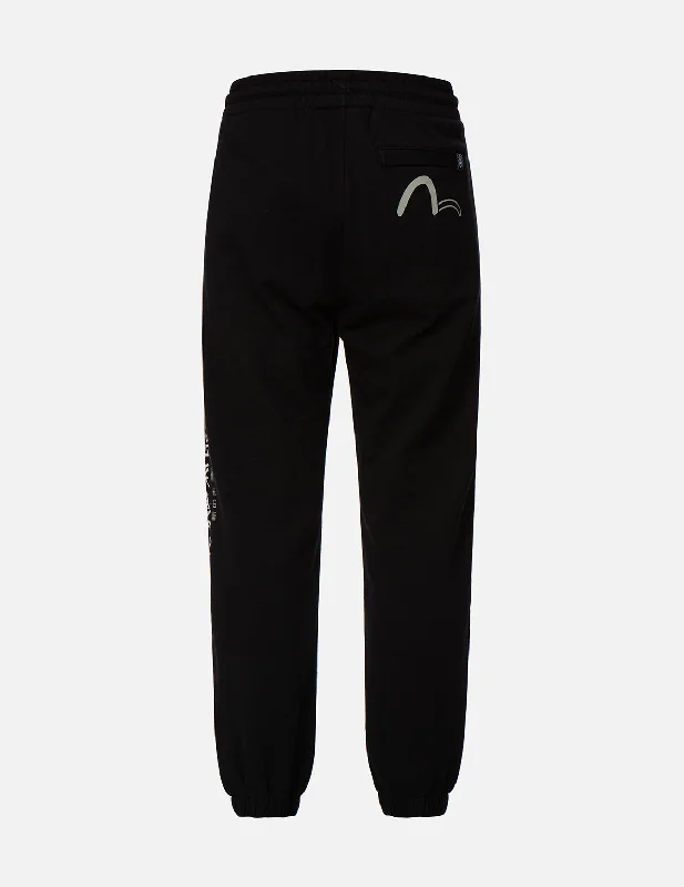 Men's camo print casual utility pants for a rugged outdoor feel Logo and Slogan Print Sweatpants